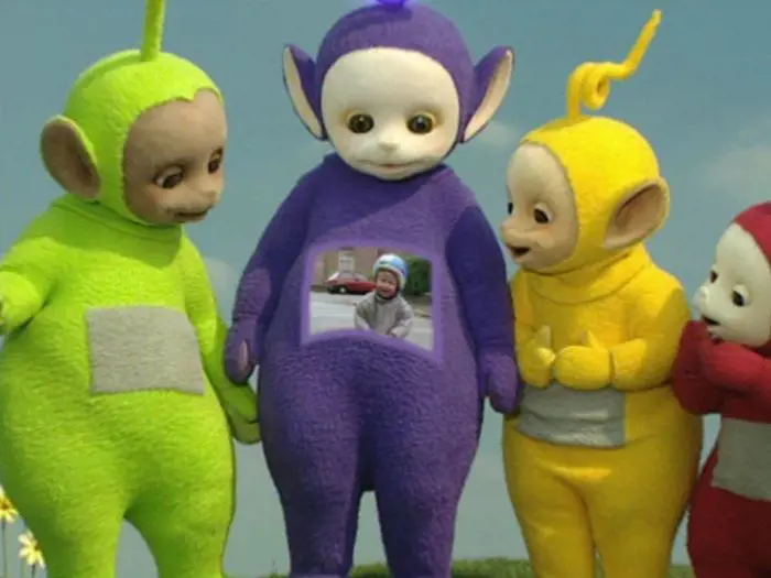 Teletubbies watching video sent by their viewers on the television attached to their stomach 