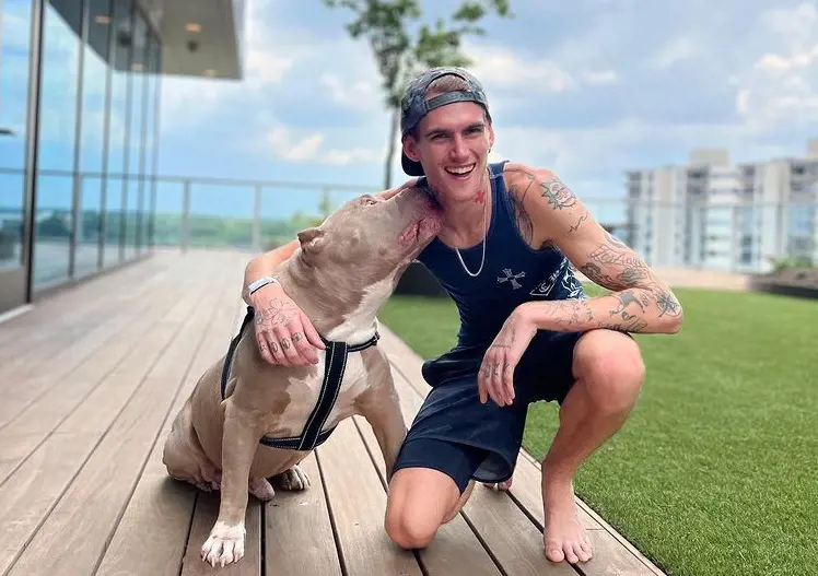 Presley Gerber looking skinny in his latest picture taken with his dog.