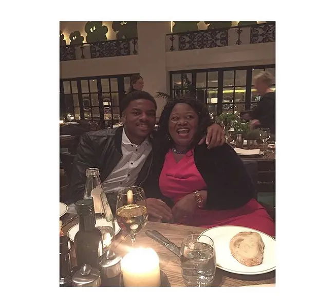 The football star Chuba Akpom celebrating his mother Patience Akpom's  birthday with all smiles on November 24, 2014.