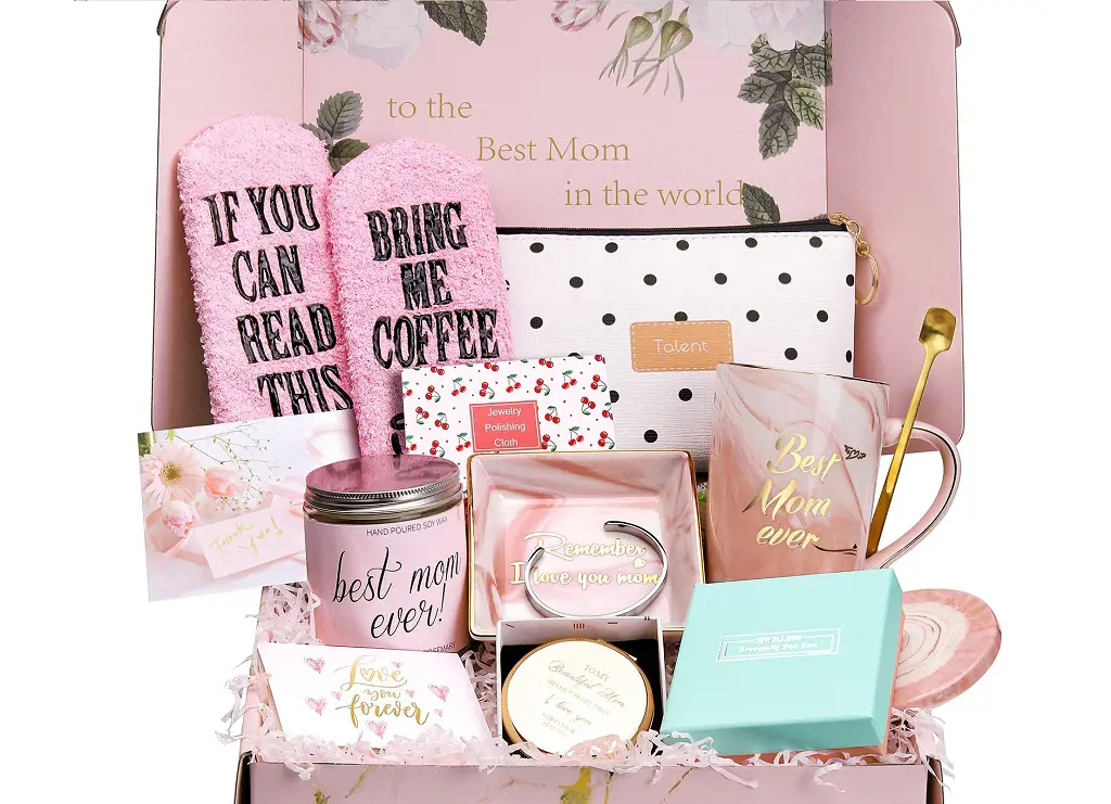 A collection of both decorative and essential items for new mothers with a mother's day wish written on the back. 