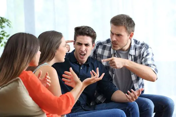 Four friends arguing over a topic as do not agree with each other