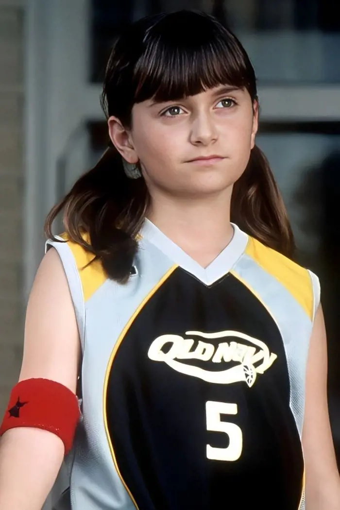 Sarah clad in a jersey and style her hair in pigtails