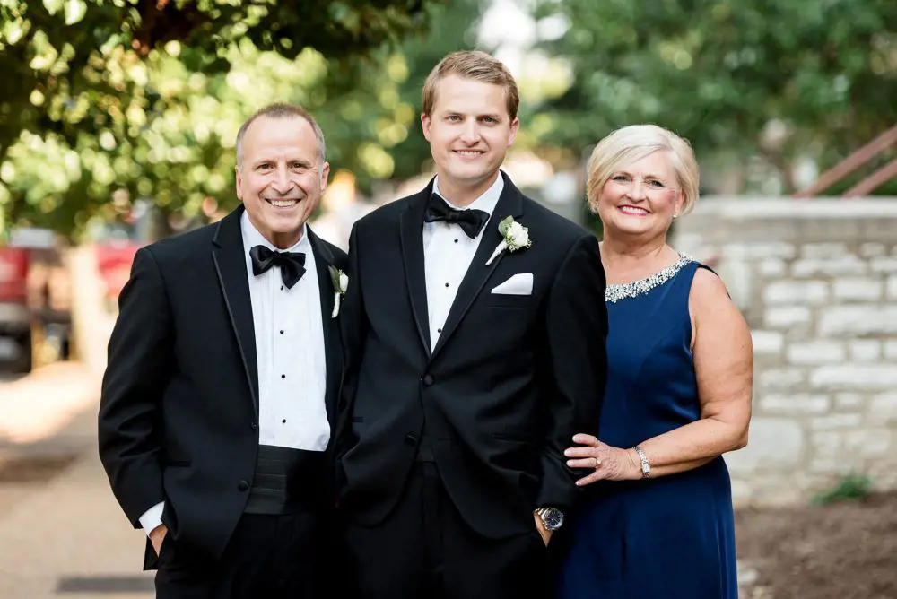 Groom with his father and mother on his big day and image is captured by photographer Ashley Fisher