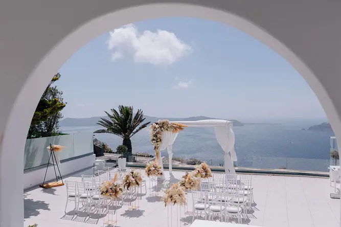 Santorini wedding venue in front of Aegean Sea