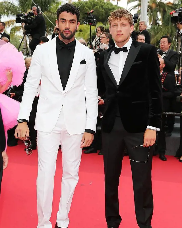 Matteo in white suit and Jacopo dressed in black suit attend the Festival de Cannes in 2022