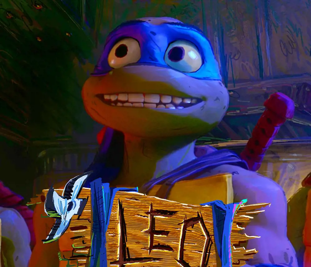 Leonardo showcases his teeth as he smiles for the poster of the movie