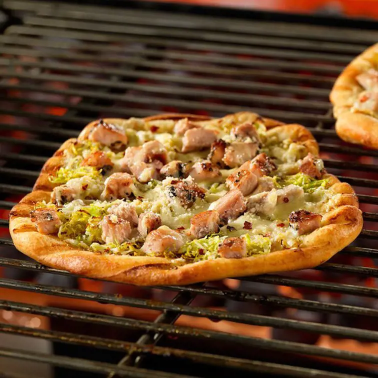Grilled Pizza is an easy to make dish during a camping trip