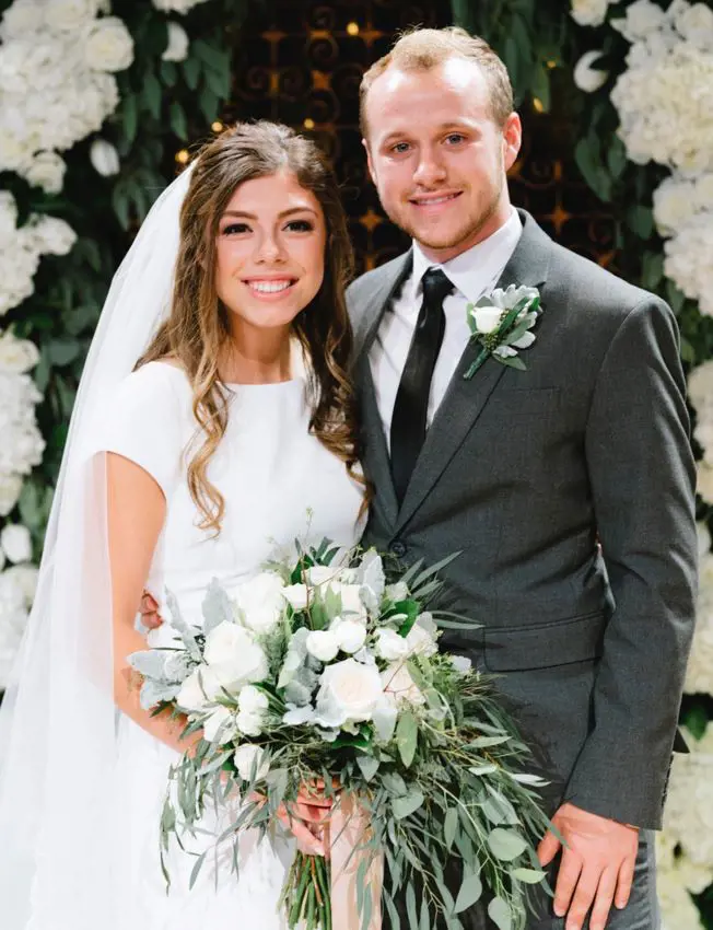 Josiah and wife Lauren on their wedding day in 2018