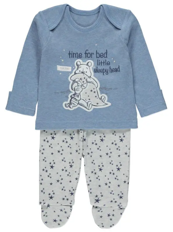 Star print footie pajama paired with blue colored t-shirt