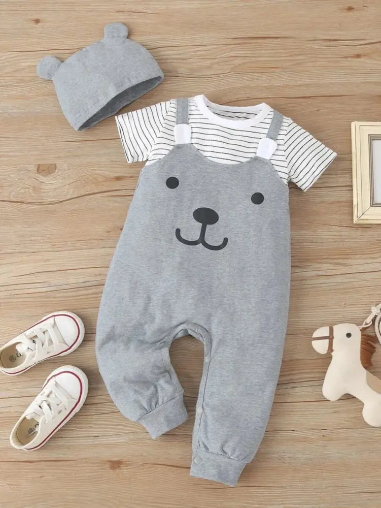 Cute grey colored overalls paired with striped t-shirt and hat for the little one