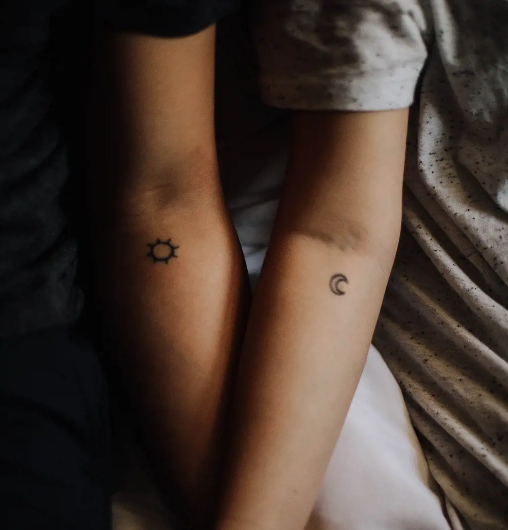 Sun and moon tattoo represent two different personalities. (Photo By: Elizabeth Tsung)