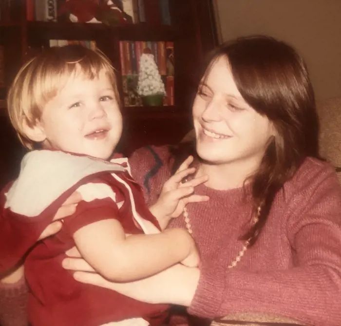 Roman with his mother Susan when he was just a toddler in 1980s. 