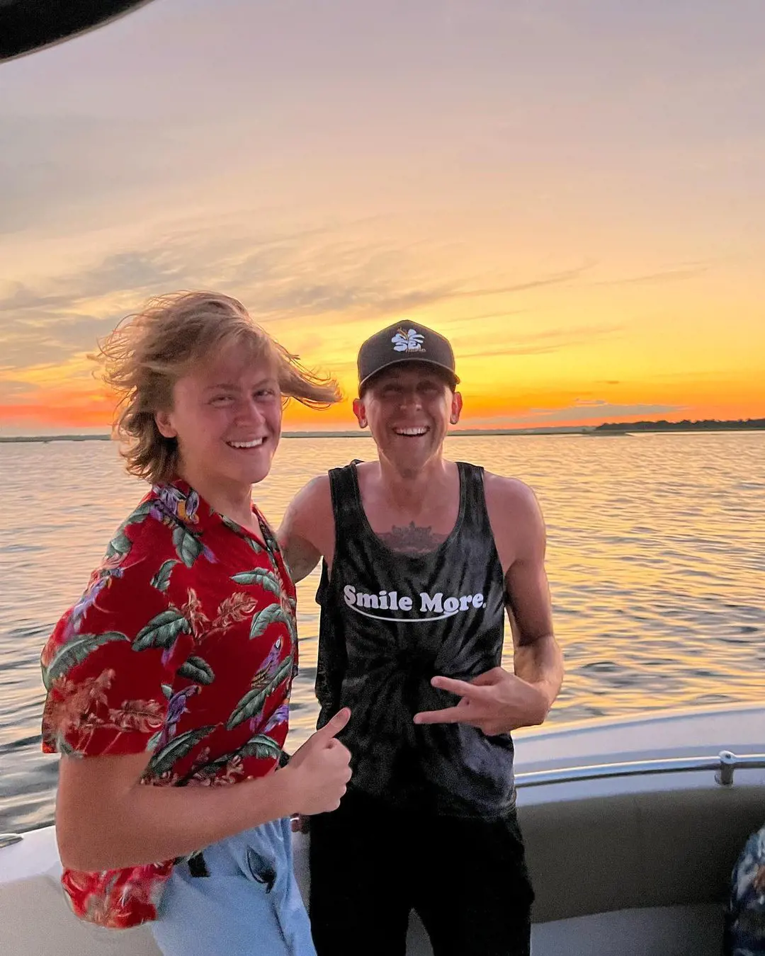 Roman having a great time with his eldest son Noah during sunset at the sea. 