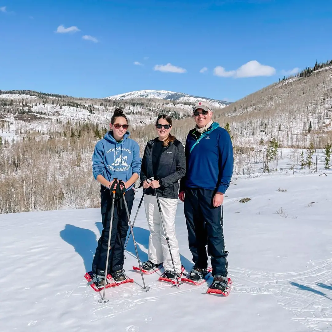 (L-R) Hannah, Tamara, and Glenn of We 3 Travel take a spring break at Vista Verde Ranch, Colorado, in April 2021. 