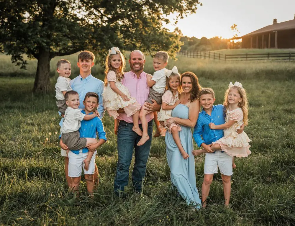 Waldrops showcases joyful expression as they click a family portrait