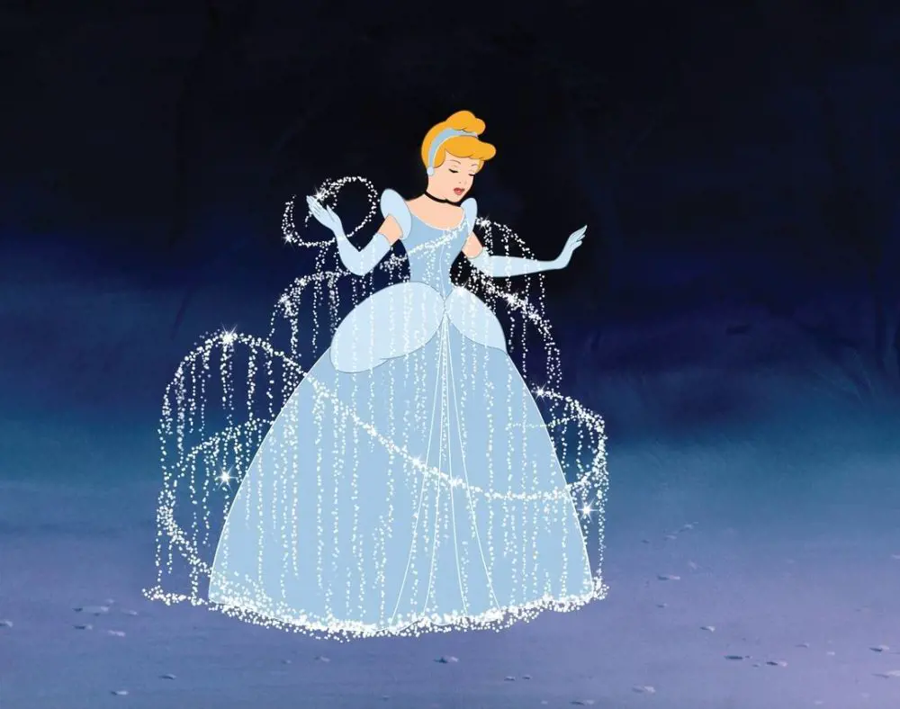 Scene from the film where the Fairy Godmother transforms Cinderella's dress with the help of her magic