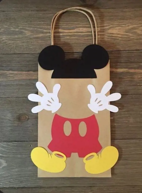 DIY Minnie Mouse Goodie Bag made up of brown bags and some printable easy cut-out designs