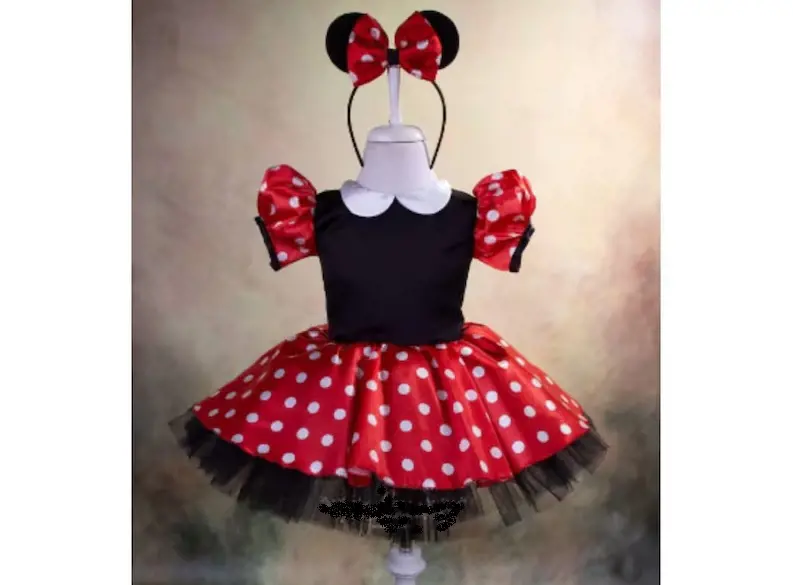 A beautiful Minnie Mouse Costume Set made with red and black fabric and white polka dots complete with mouse ears. 